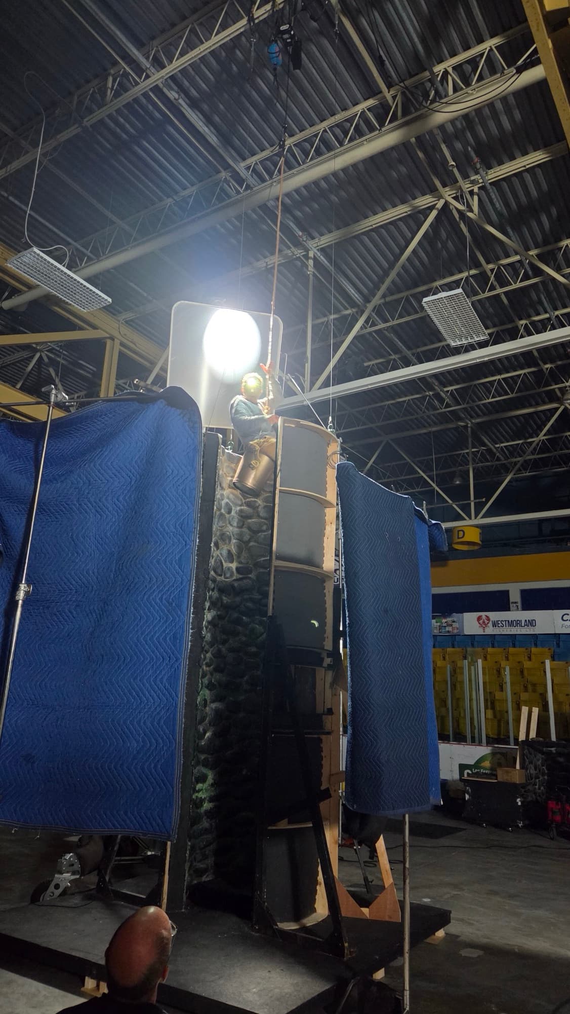 Wire rig coordination on a studio set — image 2 of 4